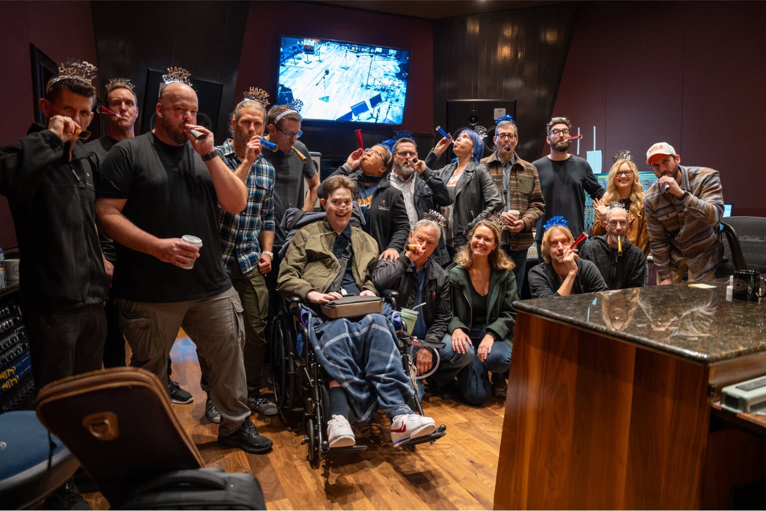 Mac with his father and the Lt. Dan Band celebrating his 33rd birthday.