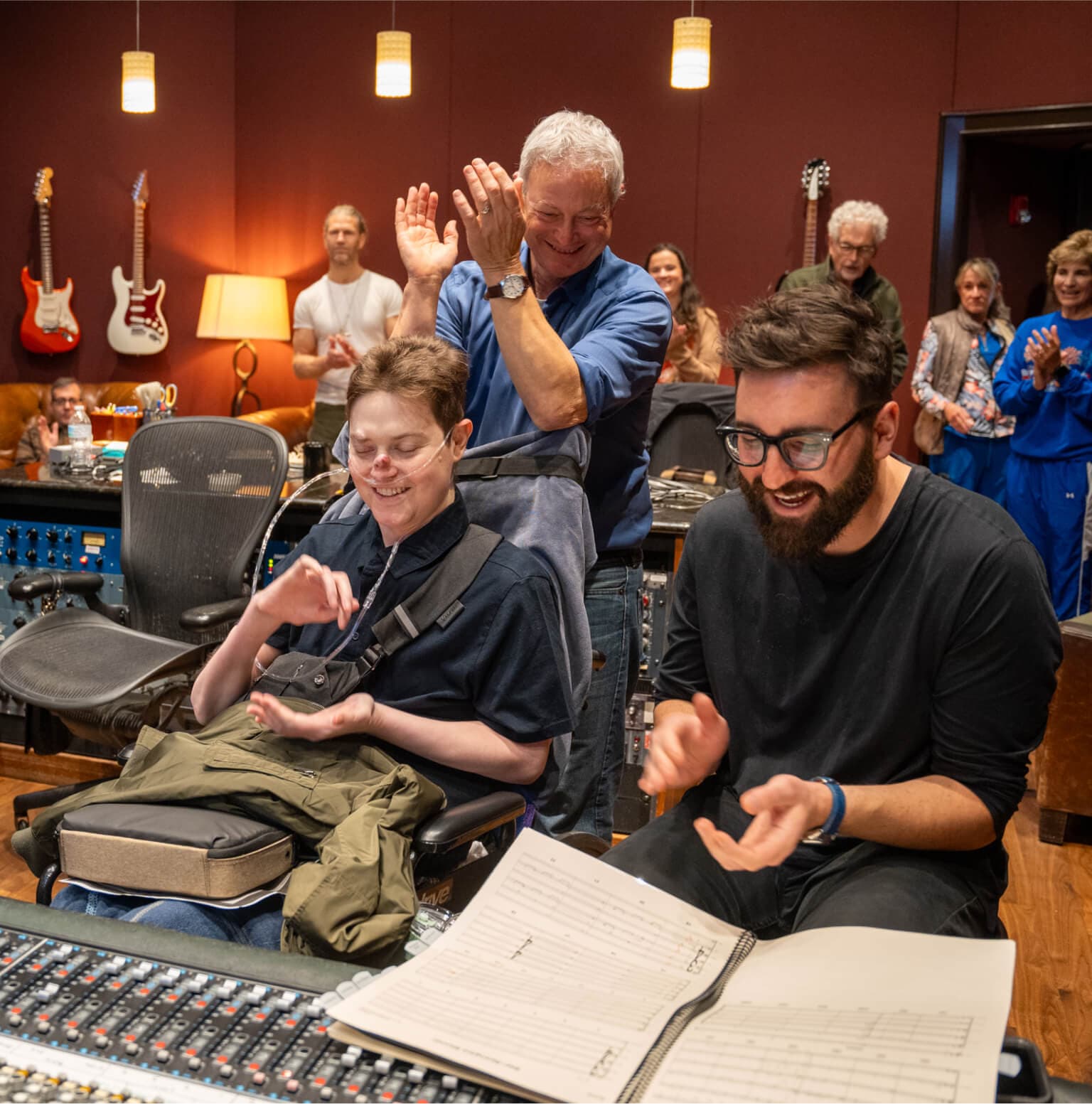 Mac with his father and Oliver in the recording studio.